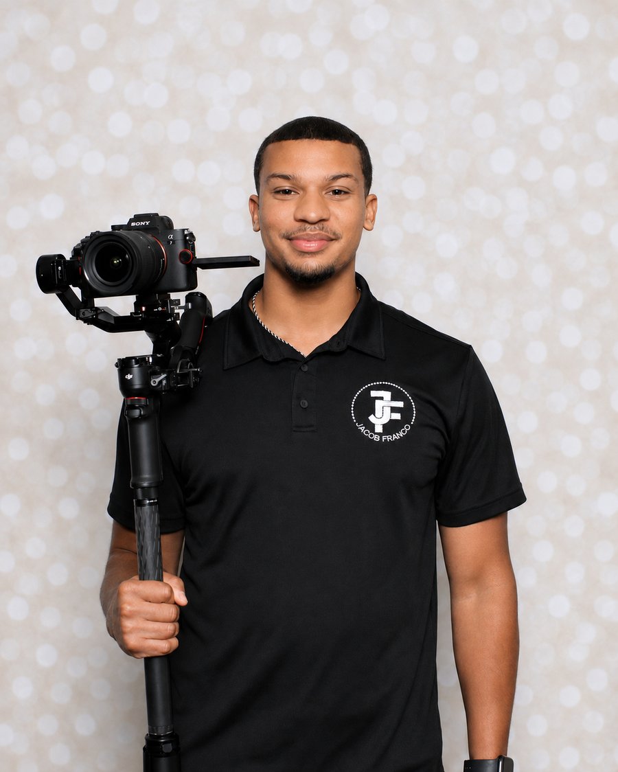 Jacob Franco holding camera gear